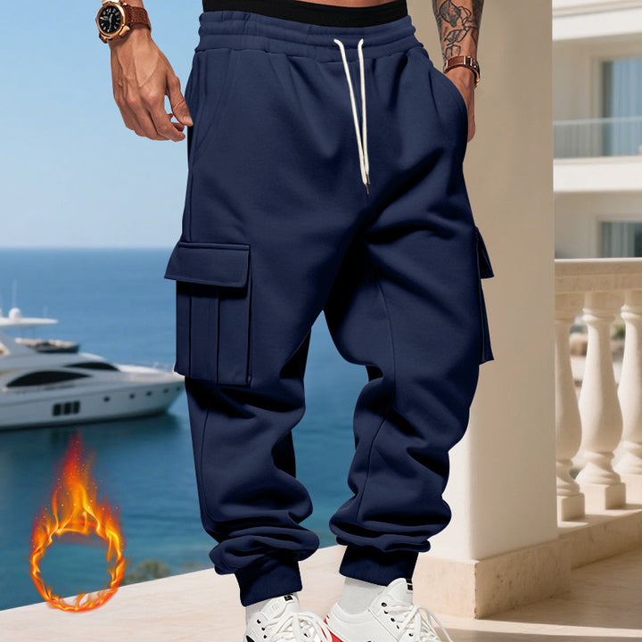 Men's cargo joggers with side pockets and elastic waistband. Chic and style.