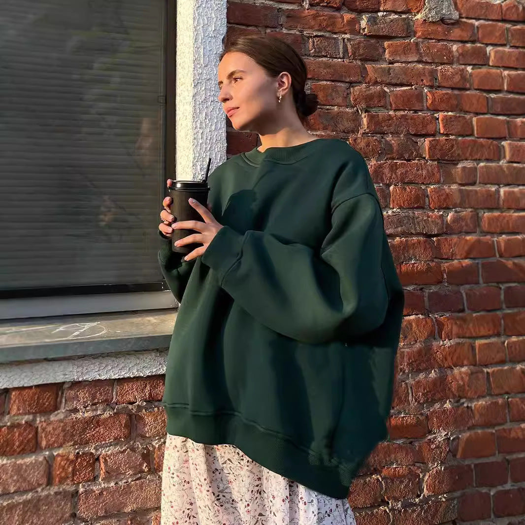Woman Oversized sweatshirt with a relaxed fit and modern chic accents and style