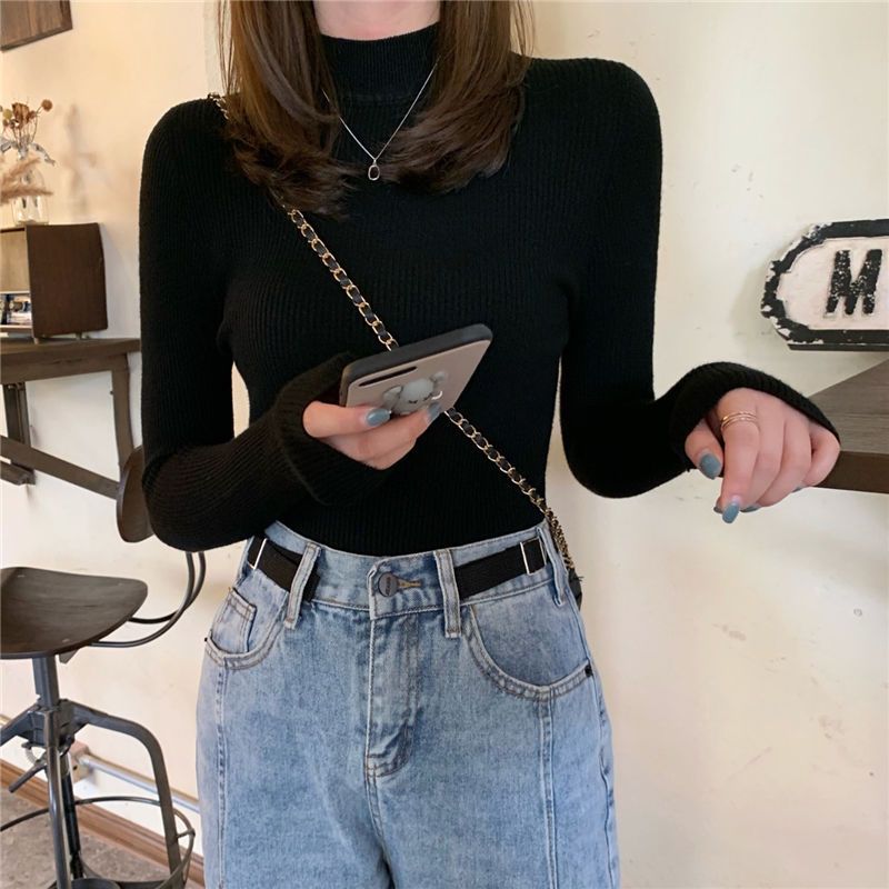 Pull à col roulé féminin à la mode en design tricot côtelé Chic & Stil