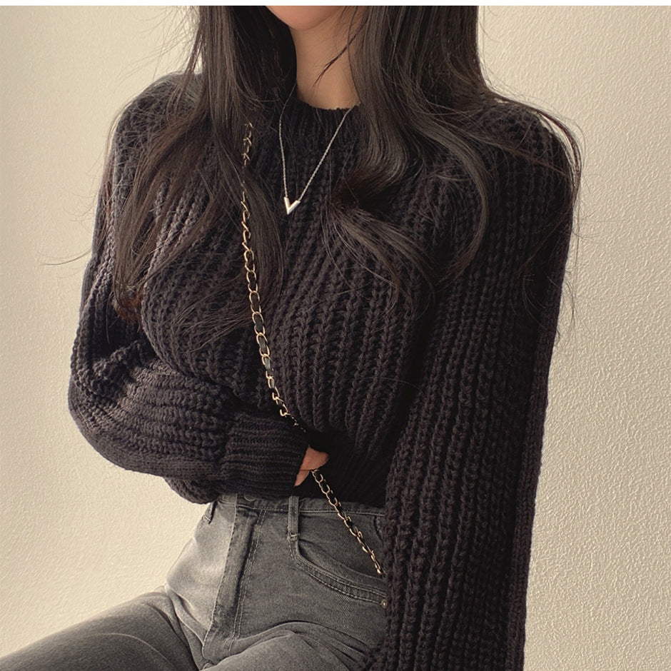 Thick knit women's sweater with oversized sleeves and a textured structure Lune London