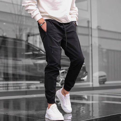 Men's sporty leisure pants with elastic waistband and practical zip pockets Lune London