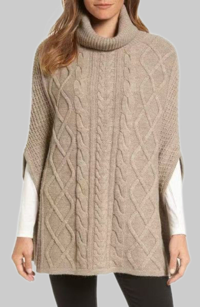 Knitted poncho for women with high collar and classic cable knit pattern Lune London