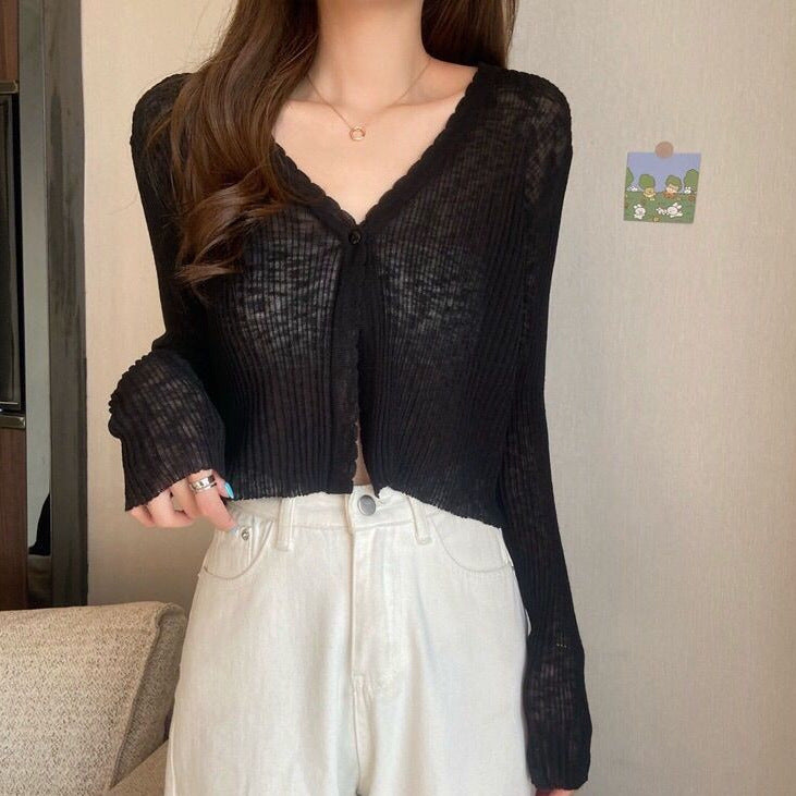 Women's casual cardigan with decorative button design and ribbed finishes