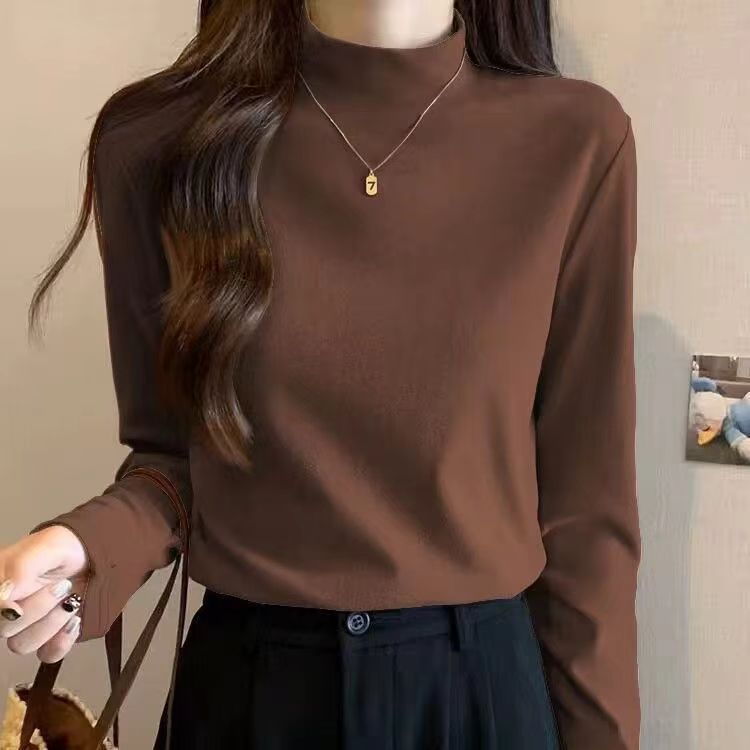 Chemise à manches longues pour femmes avec col montant et fine structure Chic & Stil