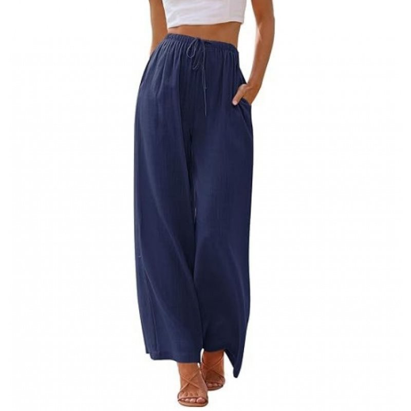 Wide palazzo pants for women with elastic waistband and side pockets Lune London