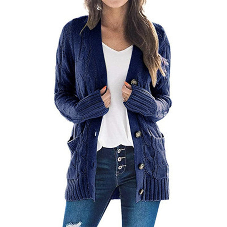 Chunky knit cardigan for women with an elaborate cable pattern and practical pockets Lune London