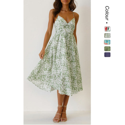 Women's midi dress with elegant wrap design and floral pattern mix Lune London