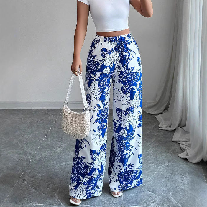 Pantalons palazzo taille haute pour femmes avec motif floral et poches latérales Chic & Stil