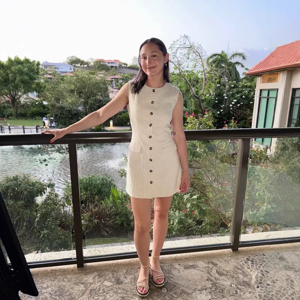 Sleeveless shirt dress for women with practical pockets and decorative button details Lune London