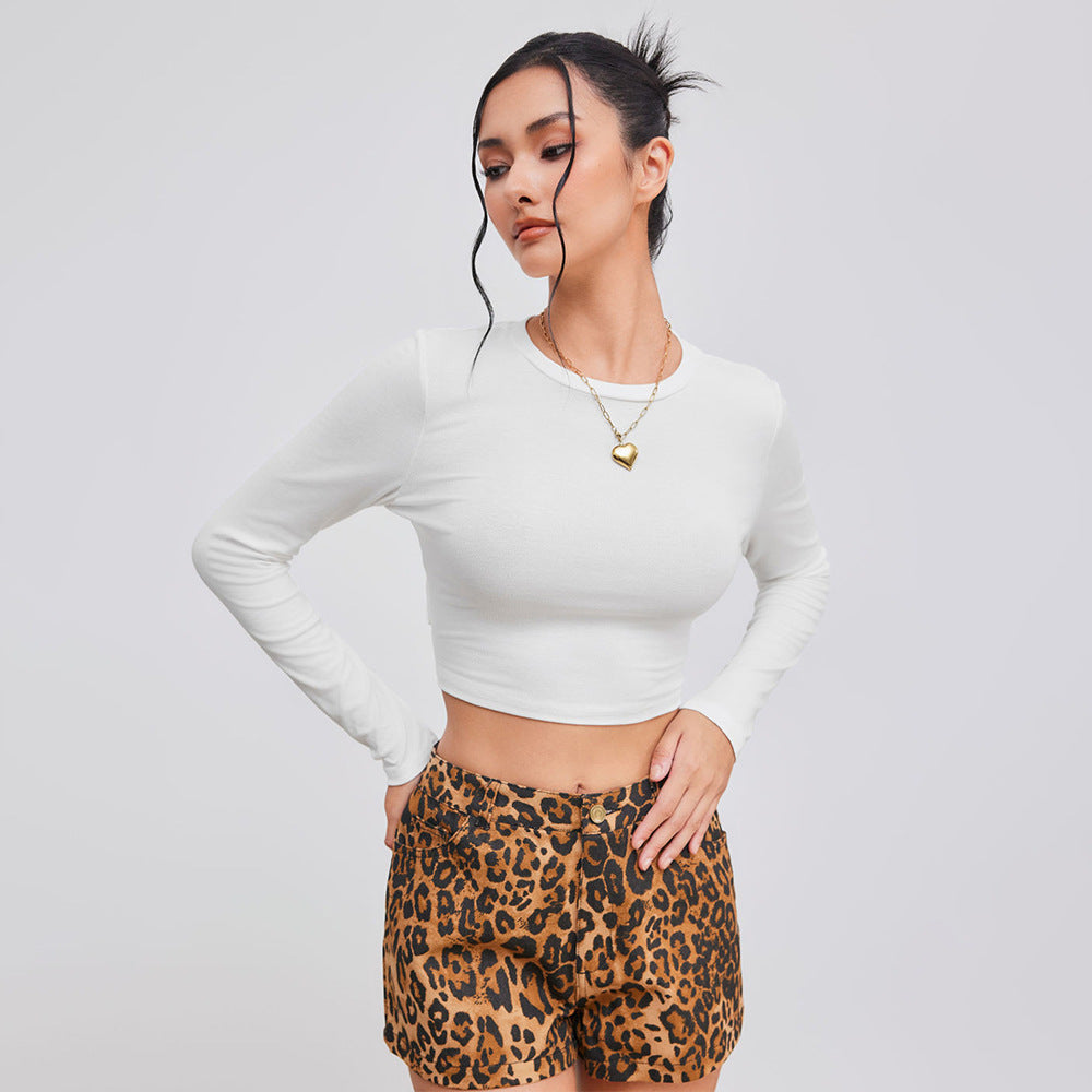 Chic & Stil Women's Cropped Long Sleeve Shirt with Elegant Round Neck and Fitted Silhouette