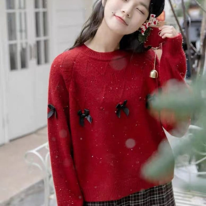 Pull confortable pour femmes avec des appliqués en nœud ludiques Chic & Stil
