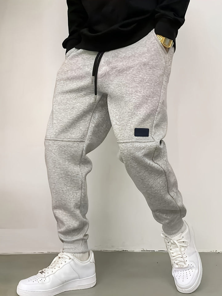 Sporty jogger pants for men with side zipper details Lune London