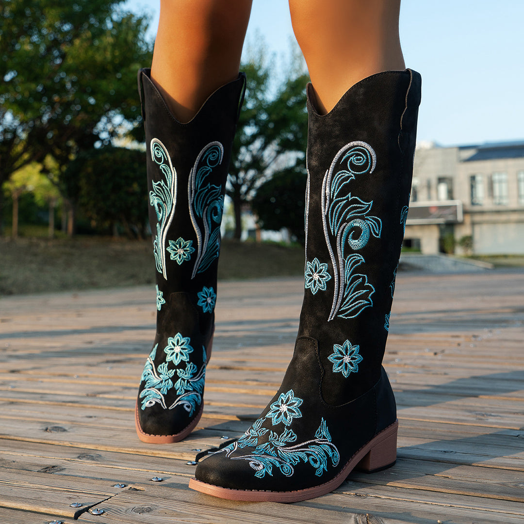Women's cowboy boots with handmade floral details and a comfortable block heel Lune London