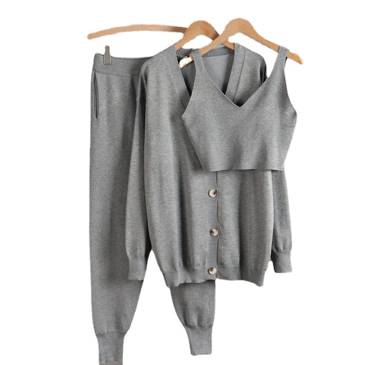 Elegant knitted women's outfit with chic button details