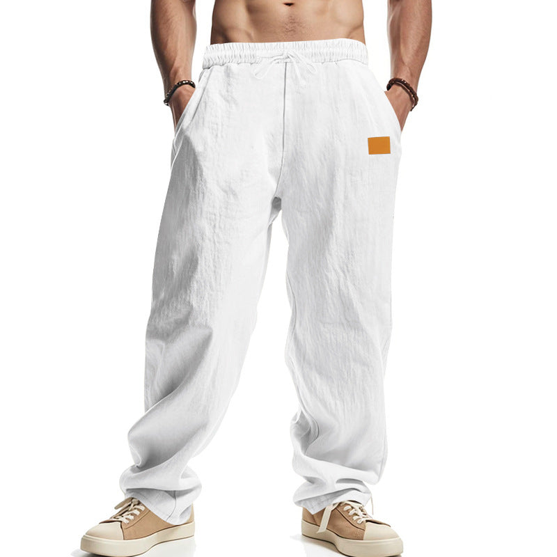 Linen pants for men with a relaxed fit featuring an adjustable drawstring and practical side pockets Lune London