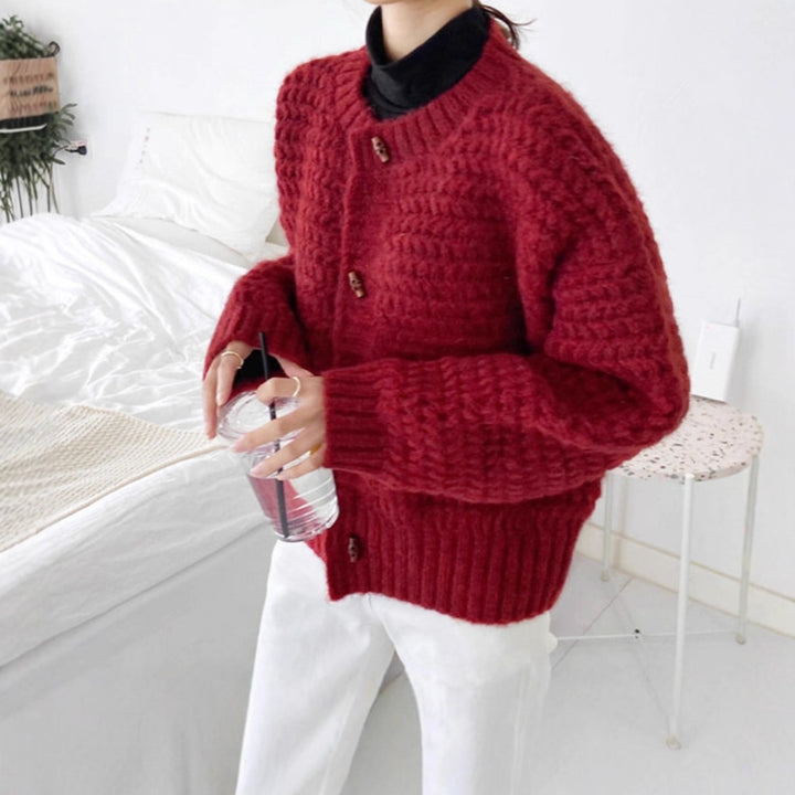Chunky knit sweater for women with decorative button placket and honeycomb pattern Lune London