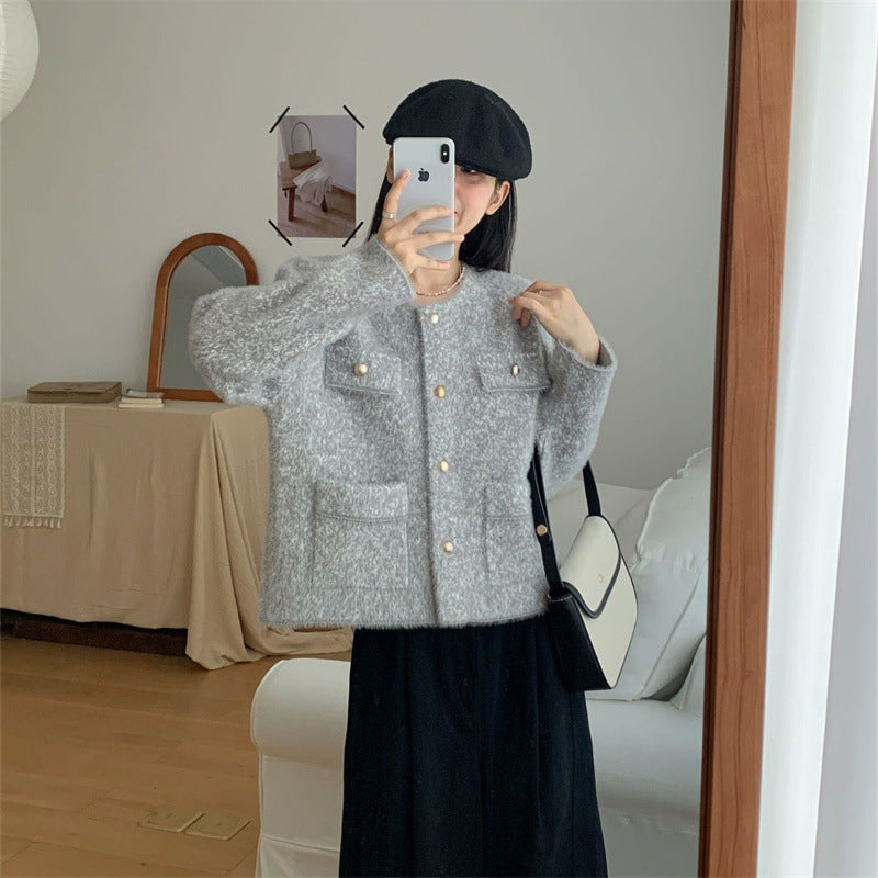 Femmes gilet douillet avec boutons en perles et poches pratiques Chic & Stil