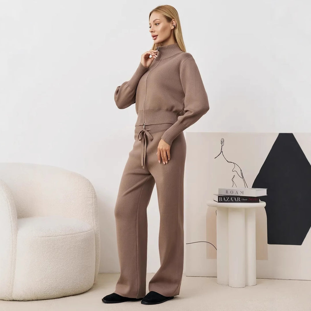 Ladies comfortable knit jumpsuit with high collar and side lace details Lune London