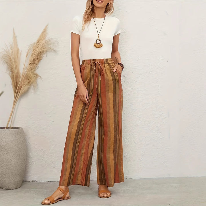 Wide striped pants for women with elastic waist and practical tie belt Lune London