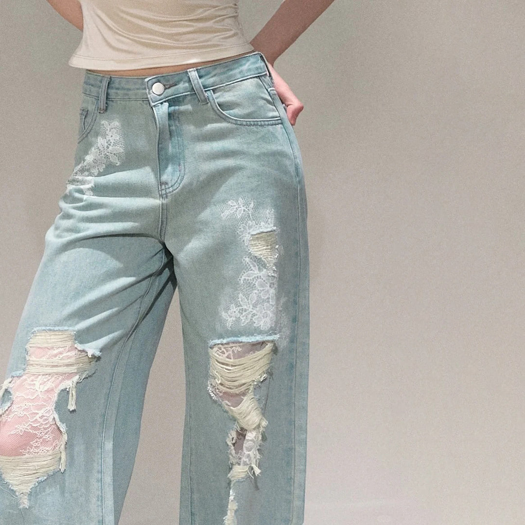 Women's wide cut jeans with individual destroyed details and floral print Lune London