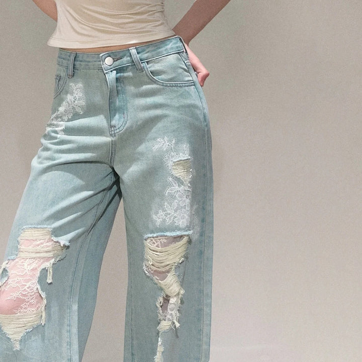 Women's wide cut jeans with individual destroyed details and floral print Lune London