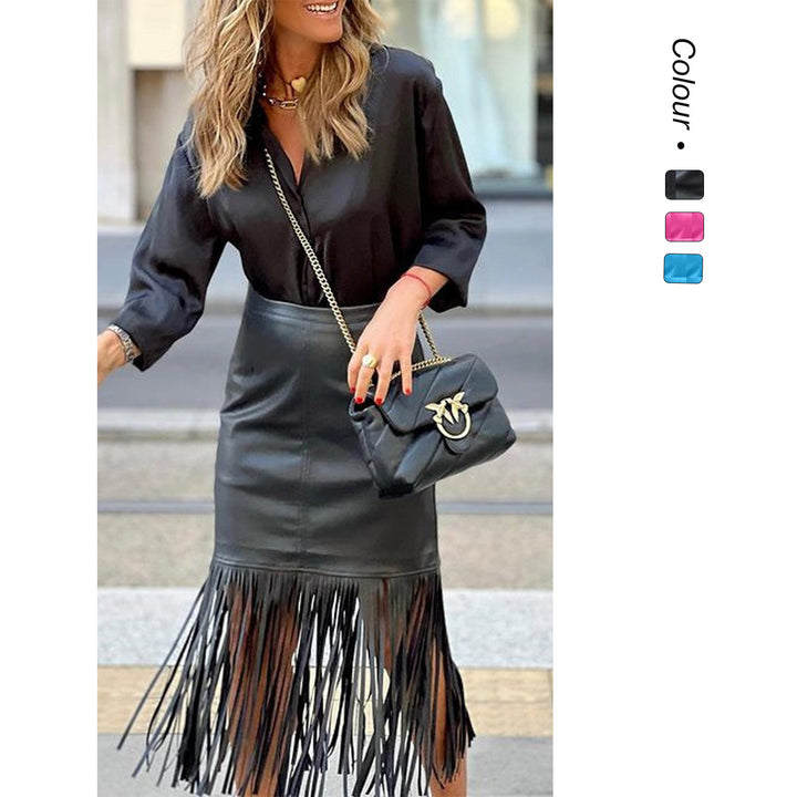 Women's fuchsia fringe skirt made of faux leather with a fitted silhouette and swinging design