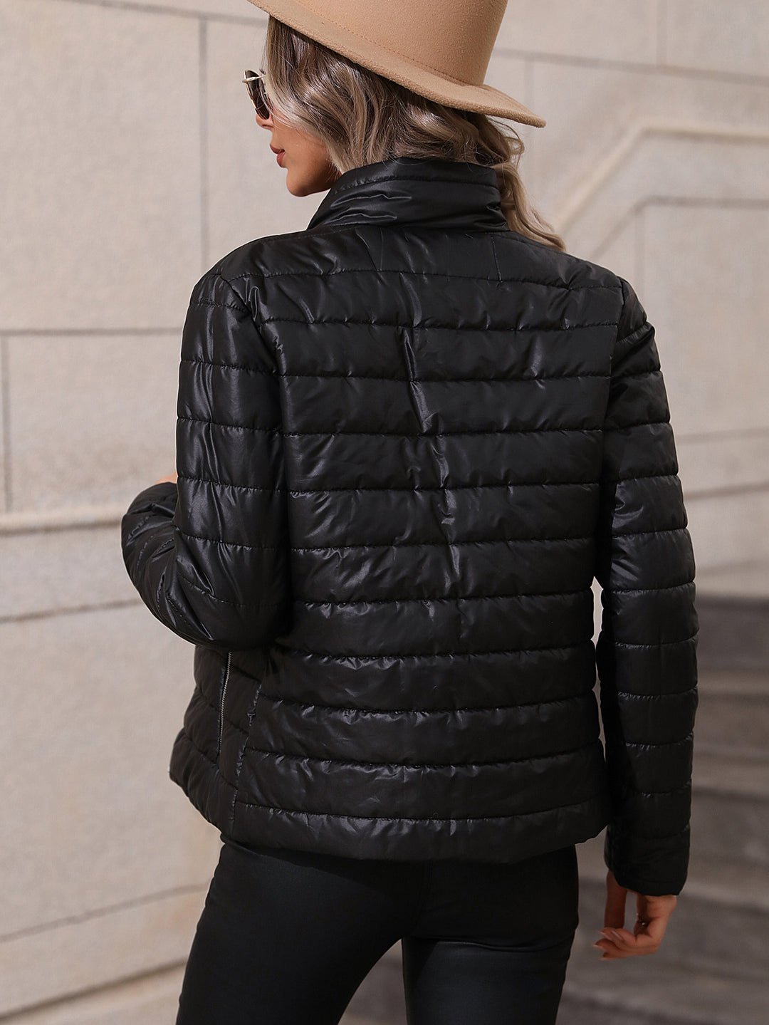 Quilted transitional jacket for women with high collar and practical pockets Lune London
