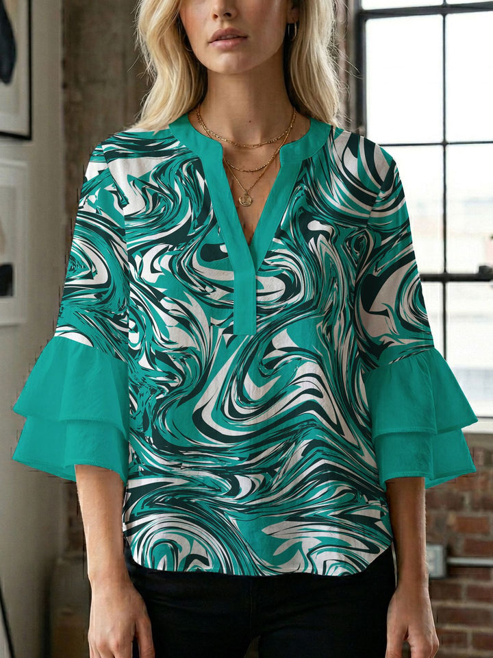 Women's blouse with voluminous wing sleeves and intense leaf pattern Lune London