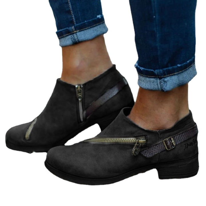 Elegant ankle boots for women with decorative zippers and a comfortable sole Lune London