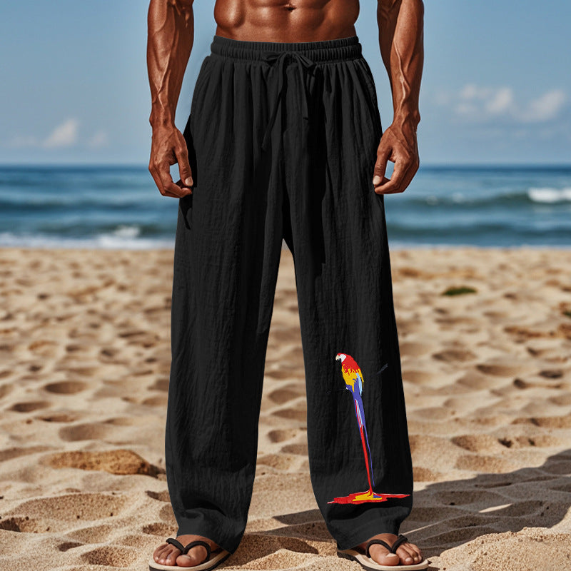 Casual beach pants for men with elastic waistband and colorful bird pattern Lune London
