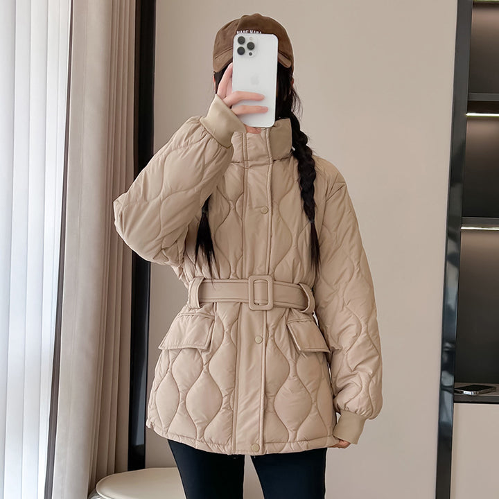 Fashion quilted jacket for women with a belted waist and practical pockets Lune London