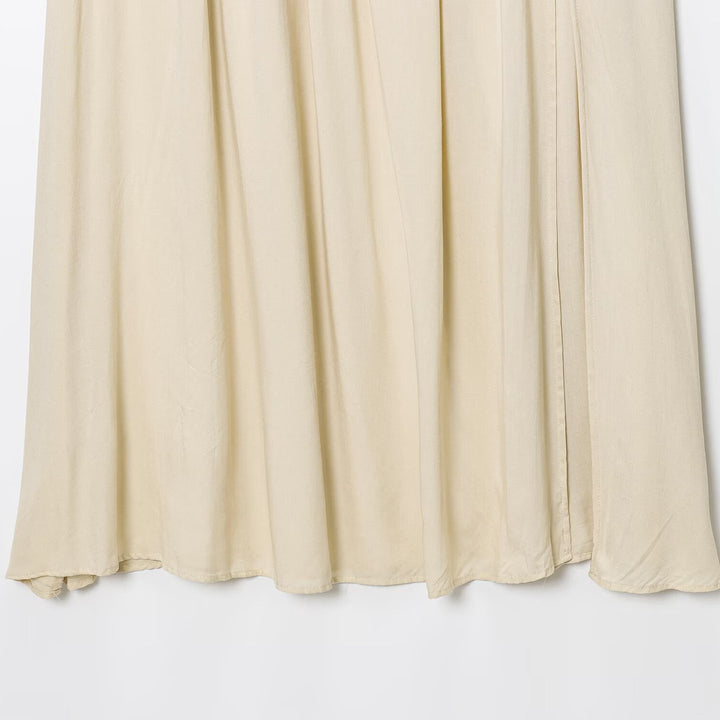 Airy midi skirt for women with an elegant pleat at the waist and a Lune London belt