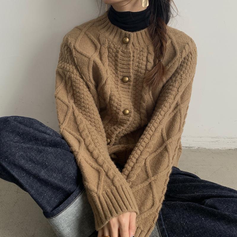 Thick knitted cardigan for women with button details and cable knit pattern Lune London