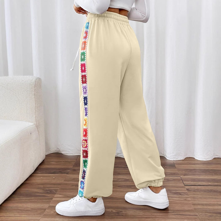 Leisure pants for women with a colorful floral pattern and an elastic waistband Lune London