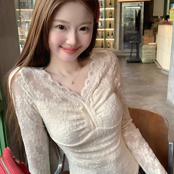 Women's lace blouse with V-neck and ruffle details Chic & Stil