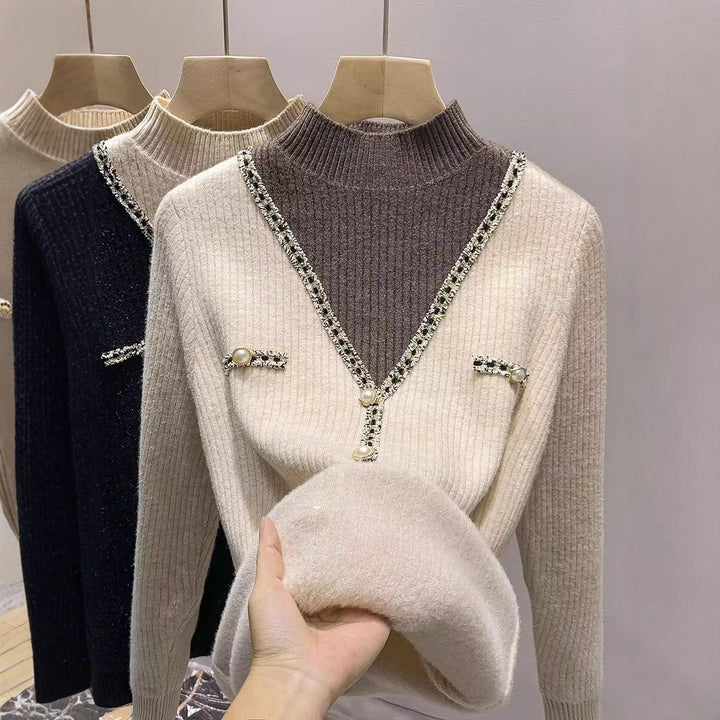 Pull femme à la mode avec col en V, détails scintillants et boutons Chic & Stil