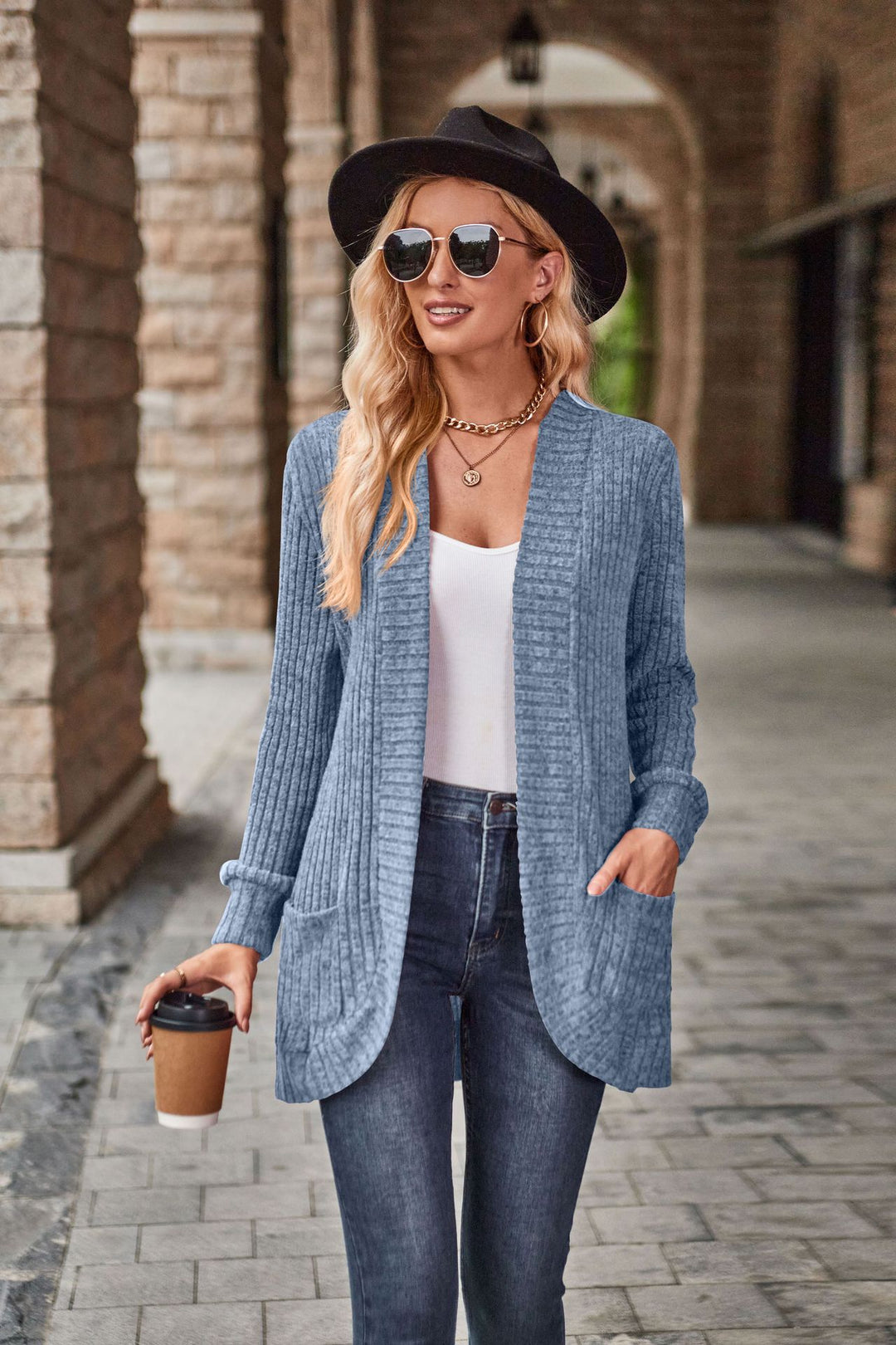 Knitted jacket for women with textured pattern and practical pockets Lune London