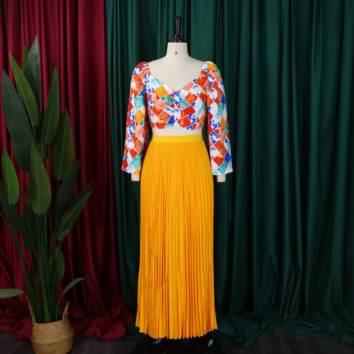 Pleated combined dress for ladies with a colorful top and a flared skirt Lune London