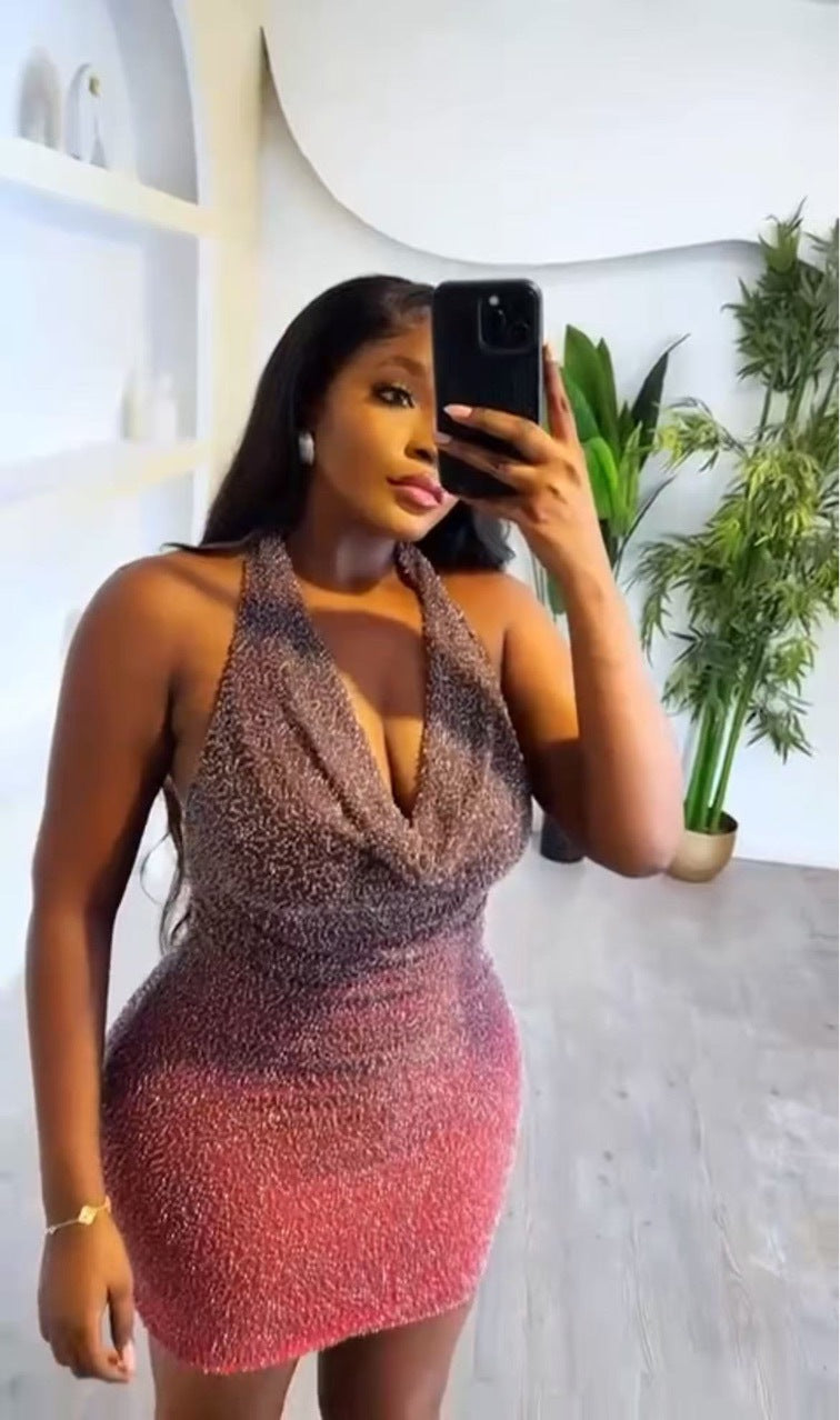 Women's Glamorous Party Dress in a figure-hugging design with a deep V-neckline and shimmering material