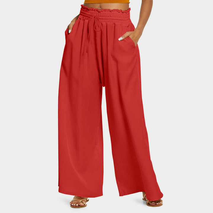 Wide palazzo pants for women with elastic waistband and practical pockets Lune London