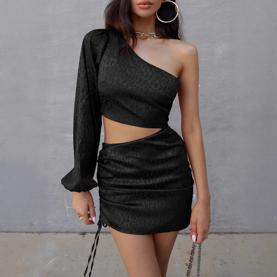 Women's mini dress with asymmetric cut and sophisticated ruffle details
