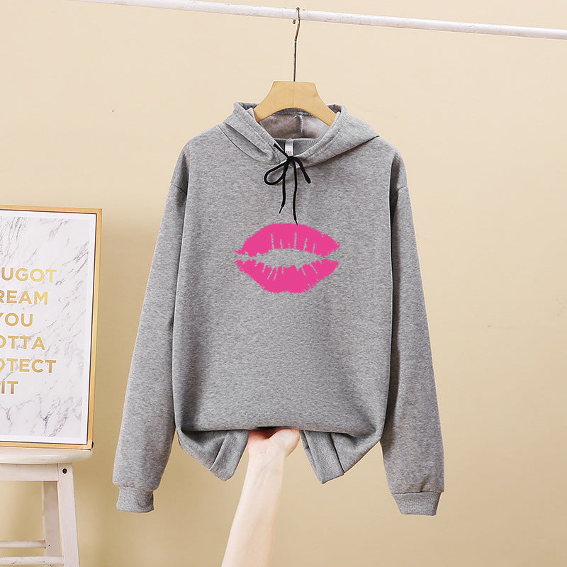 Women's hoodie with striking lip motif Chic & Stil