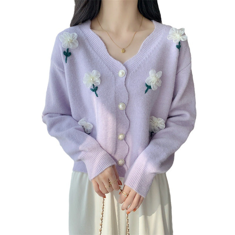 Playful women's cardigan button with floral embroidery and pearl buttons Lune London