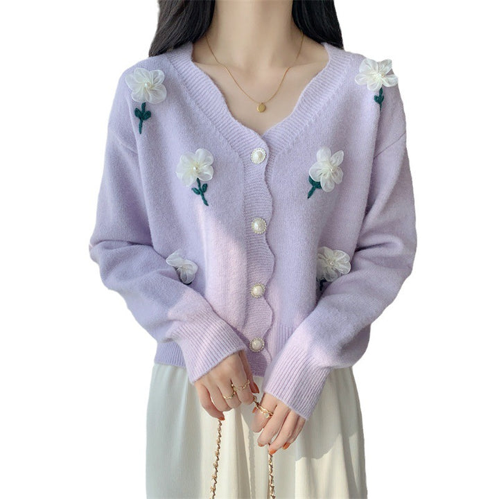 Playful women's cardigan button with floral embroidery and pearl buttons Lune London
