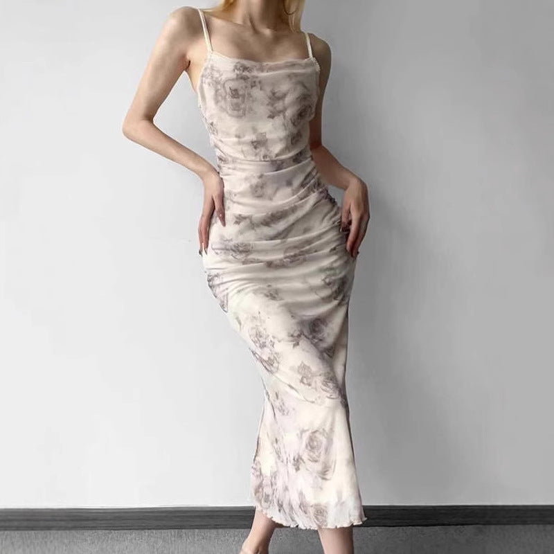 Maxi fitted dress for women with refined ruffles and a floral pattern Lune London