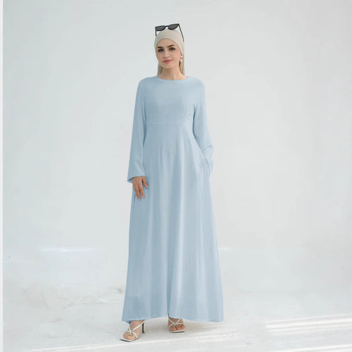 Elegant maxi dress for women with long sleeves and side pockets Lune London