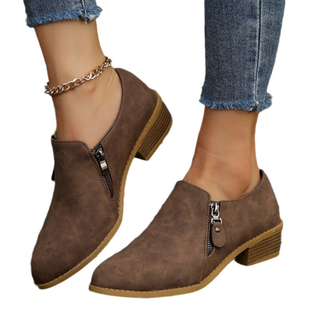 Trendy ankle boots for women with a chic zipper design Lune London