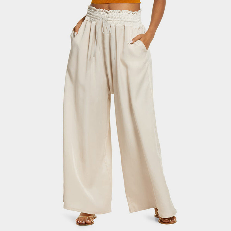 Wide palazzo pants for women with elastic waistband and practical pockets Lune London