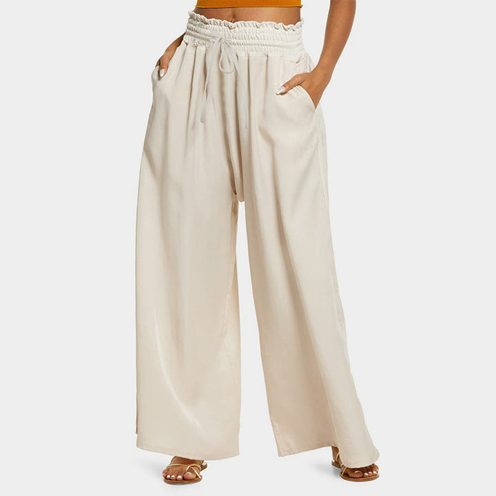 Wide palazzo pants for women with elastic waistband and practical pockets Lune London