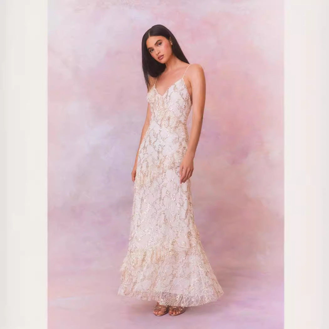 Women's lace maxi dress with shimmering appliqués and ruffle details